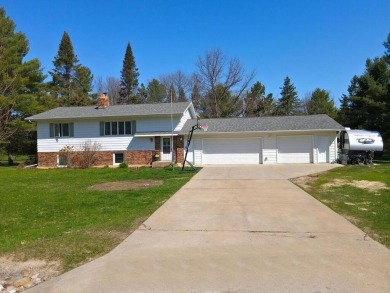 This property is ideally situated directly across from Pokegama on Pokegama Golf Course in Minnesota - for sale on GolfHomes.com, golf home, golf lot