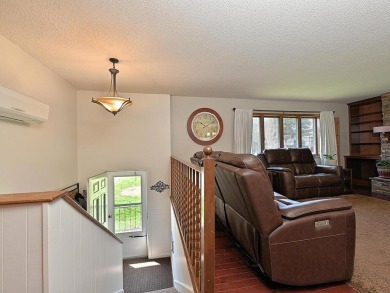 This property is ideally situated directly across from Pokegama on Pokegama Golf Course in Minnesota - for sale on GolfHomes.com, golf home, golf lot