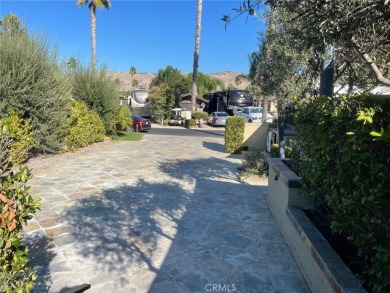 Massive Lot with all Slate Tile, Double Sided Fireplace and TV on Rancho California RV Resort in California - for sale on GolfHomes.com, golf home, golf lot