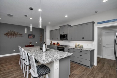 Experience resort-style living in this beautifully upgraded on Trilogy at Ocala Preserve in Florida - for sale on GolfHomes.com, golf home, golf lot