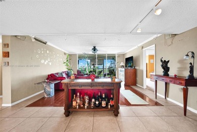 Beautifully furnished penthouse in a secure, resort-style gated on Inverrary Country Club in Florida - for sale on GolfHomes.com, golf home, golf lot