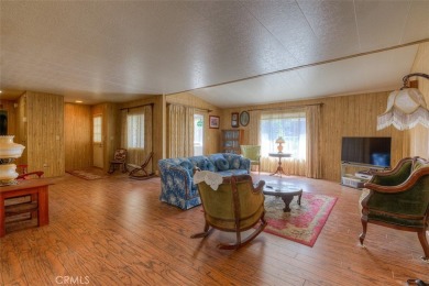 Welcome to Kelly Ridge! This spacious 1980 MH has a 433A on Lake Oroville Golf and Event Center in California - for sale on GolfHomes.com, golf home, golf lot