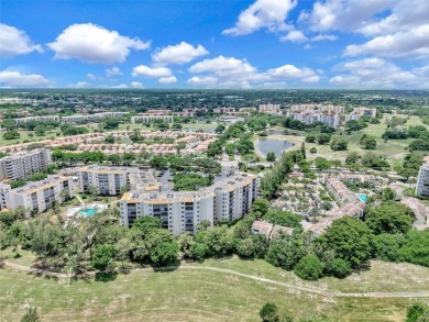 Beautifully furnished penthouse in a secure, resort-style gated on Inverrary Country Club in Florida - for sale on GolfHomes.com, golf home, golf lot