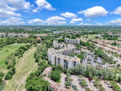 Beautifully furnished penthouse in a secure, resort-style gated on Inverrary Country Club in Florida - for sale on GolfHomes.com, golf home, golf lot