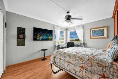 Beautifully furnished penthouse in a secure, resort-style gated on Inverrary Country Club in Florida - for sale on GolfHomes.com, golf home, golf lot