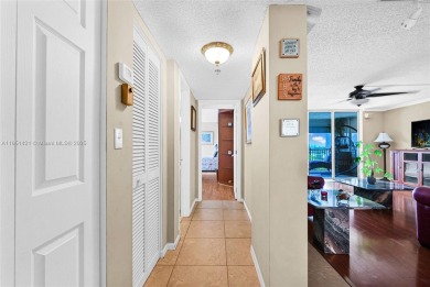 Beautifully furnished penthouse in a secure, resort-style gated on Inverrary Country Club in Florida - for sale on GolfHomes.com, golf home, golf lot