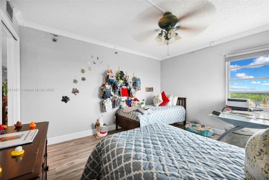 Beautifully furnished penthouse in a secure, resort-style gated on Inverrary Country Club in Florida - for sale on GolfHomes.com, golf home, golf lot