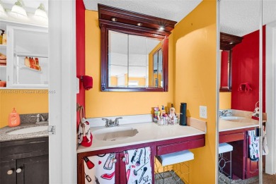 Beautifully furnished penthouse in a secure, resort-style gated on Inverrary Country Club in Florida - for sale on GolfHomes.com, golf home, golf lot