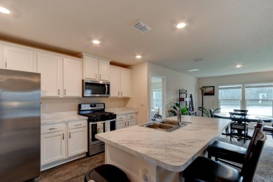 This beautifully maintained, nearly new 3-bedroom, 2-bath home on Grand Reserve Golf Course in Florida - for sale on GolfHomes.com, golf home, golf lot