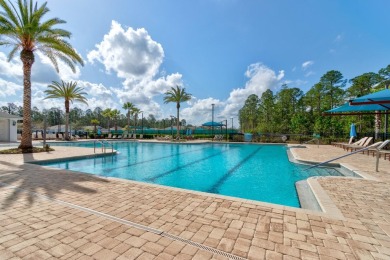 This beautifully maintained, nearly new 3-bedroom, 2-bath home on Grand Reserve Golf Course in Florida - for sale on GolfHomes.com, golf home, golf lot
