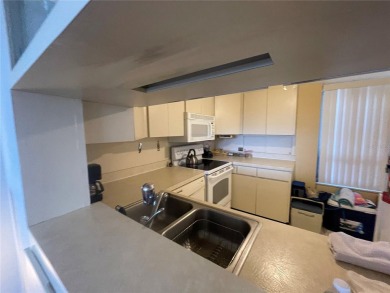 Best deal around! This attractive and affordable condominium on Cove Cay Country Club in Florida - for sale on GolfHomes.com, golf home, golf lot