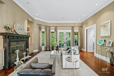 Tucked along the Rock Creek Golf Course in Fairhope, this on Rock Creek Golf Club in Alabama - for sale on GolfHomes.com, golf home, golf lot