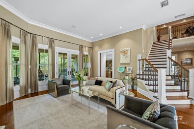 Tucked along the Rock Creek Golf Course in Fairhope, this on Rock Creek Golf Club in Alabama - for sale on GolfHomes.com, golf home, golf lot