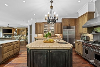 Tucked along the Rock Creek Golf Course in Fairhope, this on Rock Creek Golf Club in Alabama - for sale on GolfHomes.com, golf home, golf lot