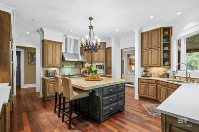 Tucked along the Rock Creek Golf Course in Fairhope, this on Rock Creek Golf Club in Alabama - for sale on GolfHomes.com, golf home, golf lot