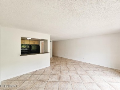 Step into this delightful one-bedroom second-floor condo, where on Daytona Beach Golf Club in Florida - for sale on GolfHomes.com, golf home, golf lot
