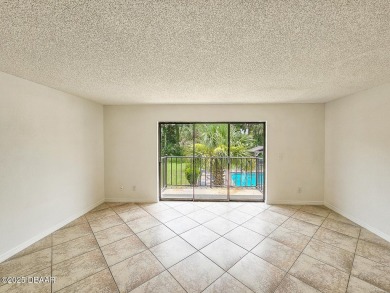 Step into this delightful one-bedroom second-floor condo, where on Daytona Beach Golf Club in Florida - for sale on GolfHomes.com, golf home, golf lot