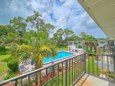 Step into this delightful one-bedroom second-floor condo, where on Daytona Beach Golf Club in Florida - for sale on GolfHomes.com, golf home, golf lot