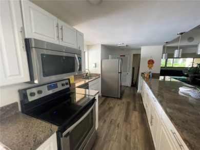Best deal around! This attractive and affordable condominium on Cove Cay Country Club in Florida - for sale on GolfHomes.com, golf home, golf lot