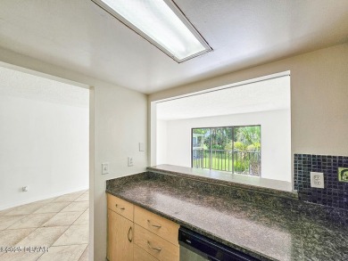 Step into this delightful one-bedroom second-floor condo, where on Daytona Beach Golf Club in Florida - for sale on GolfHomes.com, golf home, golf lot