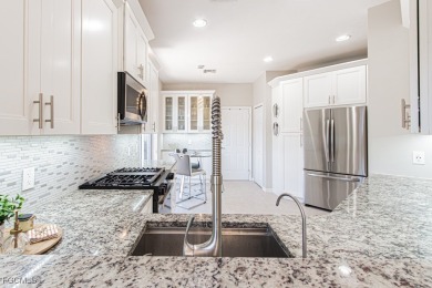Welcome to the stunning Rafael model pool home, located in Avila on Pelican Preserve Golf Club in Florida - for sale on GolfHomes.com, golf home, golf lot