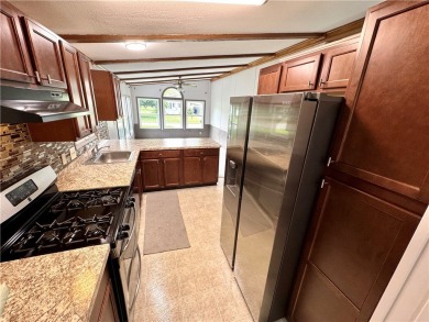 Welcome to 6404 Kims Drive in the Gypsum Mills Estates Community on Winding Creek Executive Course in New York - for sale on GolfHomes.com, golf home, golf lot