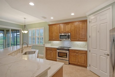 This gorgeous condominium with hurricane shutters and complete on Venetian Golf and River Club in Florida - for sale on GolfHomes.com, golf home, golf lot