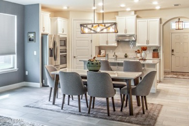 Exquisite 3-Bed, 3-Bath. 3-Car Garage Retreat in Halifax on Halifax Plantation Golf Club in Florida - for sale on GolfHomes.com, golf home, golf lot