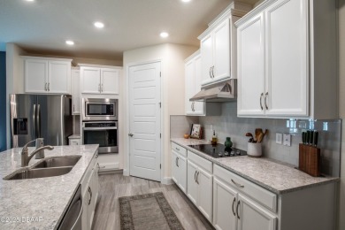 Exquisite 3-Bed, 3-Bath. 3-Car Garage Retreat in Halifax on Halifax Plantation Golf Club in Florida - for sale on GolfHomes.com, golf home, golf lot
