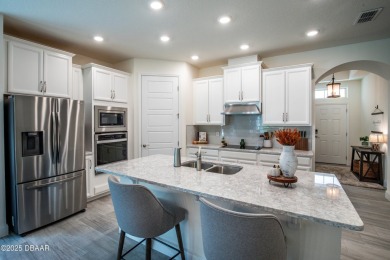 Exquisite 3-Bed, 3-Bath. 3-Car Garage Retreat in Halifax on Halifax Plantation Golf Club in Florida - for sale on GolfHomes.com, golf home, golf lot