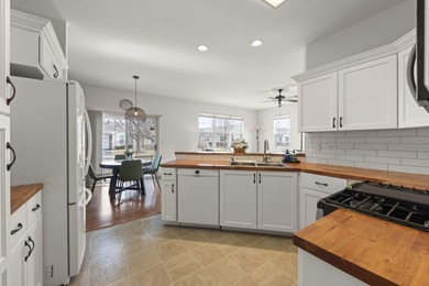 Move-in ready and beautifully updated Whitney Ranch Quad in on Carillon Lakes 3 Hole Course in Illinois - for sale on GolfHomes.com, golf home, golf lot