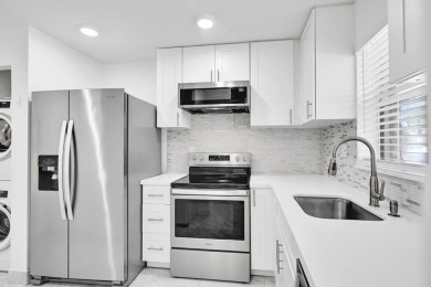 Beautifully updated 1 bed, 1.5 bath condo in the heart of on Sunrise Lakes Phase IV Golf Course in Florida - for sale on GolfHomes.com, golf home, golf lot