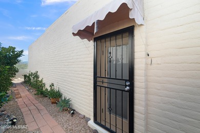 This well-maintained townhome offers elevated golf course and on Desert Hills Golf Club of Green Valley in Arizona - for sale on GolfHomes.com, golf home, golf lot