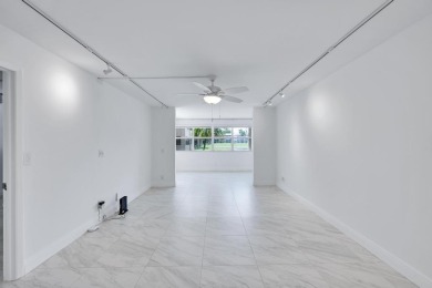 Beautifully updated 1 bed, 1.5 bath condo in the heart of on Sunrise Lakes Phase IV Golf Course in Florida - for sale on GolfHomes.com, golf home, golf lot