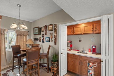 This well-maintained townhome offers elevated golf course and on Desert Hills Golf Club of Green Valley in Arizona - for sale on GolfHomes.com, golf home, golf lot