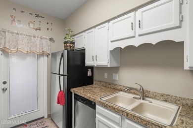 This well-maintained townhome offers elevated golf course and on Desert Hills Golf Club of Green Valley in Arizona - for sale on GolfHomes.com, golf home, golf lot