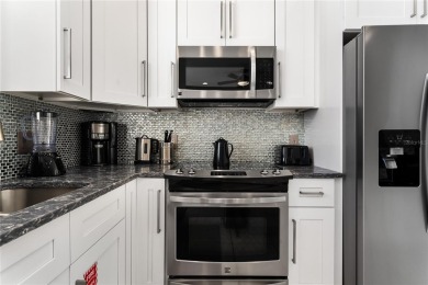 Situated in the highly sought-after Liberty Bluff neighborhood on Reunion Resort Golf Course in Florida - for sale on GolfHomes.com, golf home, golf lot