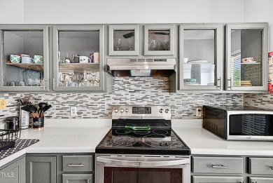 Welcome to 5351 Cog Hill Court, a rare end-unit townhome in the on Hedingham Golf and Athletic Club in North Carolina - for sale on GolfHomes.com, golf home, golf lot