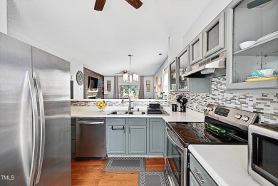 Welcome to 5351 Cog Hill Court, a rare end-unit townhome in the on Hedingham Golf and Athletic Club in North Carolina - for sale on GolfHomes.com, golf home, golf lot