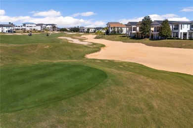 Situated in the highly sought-after Liberty Bluff neighborhood on Reunion Resort Golf Course in Florida - for sale on GolfHomes.com, golf home, golf lot