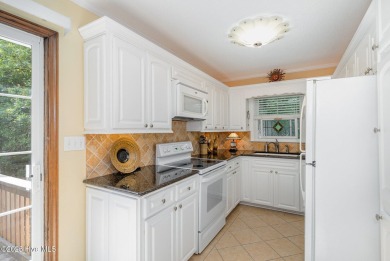 Experience lakeside living in this pristine 4 bed, 3 bath home on Seven Lakes Country Club in North Carolina - for sale on GolfHomes.com, golf home, golf lot