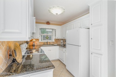 Experience lakeside living in this pristine 4 bed, 3 bath home on Seven Lakes Country Club in North Carolina - for sale on GolfHomes.com, golf home, golf lot