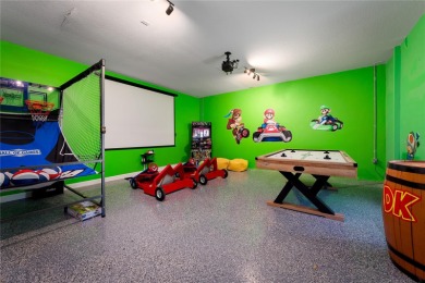 Situated in the highly sought-after Liberty Bluff neighborhood on Reunion Resort Golf Course in Florida - for sale on GolfHomes.com, golf home, golf lot