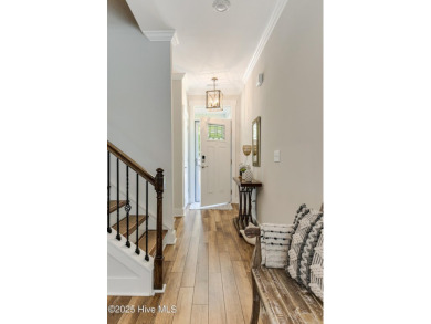 This gorgeous townhome resides in the Smithfield III section of on Brunswick Plantation and Golf Resorts in North Carolina - for sale on GolfHomes.com, golf home, golf lot