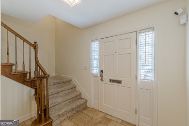 Welcome to this beautifully maintained all-brick townhome that on Dunwoody Country Club in Georgia - for sale on GolfHomes.com, golf home, golf lot