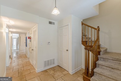 Welcome to this beautifully maintained all-brick townhome that on Dunwoody Country Club in Georgia - for sale on GolfHomes.com, golf home, golf lot