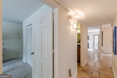 Welcome to this beautifully maintained all-brick townhome that on Dunwoody Country Club in Georgia - for sale on GolfHomes.com, golf home, golf lot