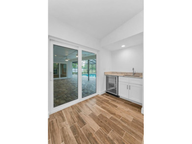 Under contract-accepting backup offers. Fully Renovated on Feather Sound Country Club in Florida - for sale on GolfHomes.com, golf home, golf lot