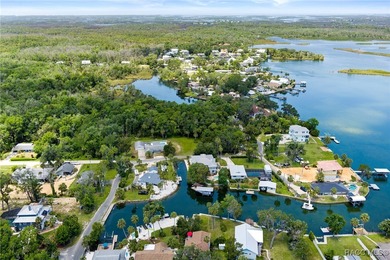 This updated waterfront stilt (DID NOT FLOOD) home in Crystal on Plantation Inn and Golf Resort  in Florida - for sale on GolfHomes.com, golf home, golf lot