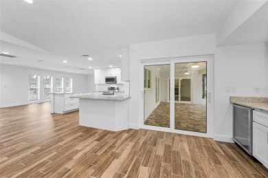 Under contract-accepting backup offers. Fully Renovated on Feather Sound Country Club in Florida - for sale on GolfHomes.com, golf home, golf lot